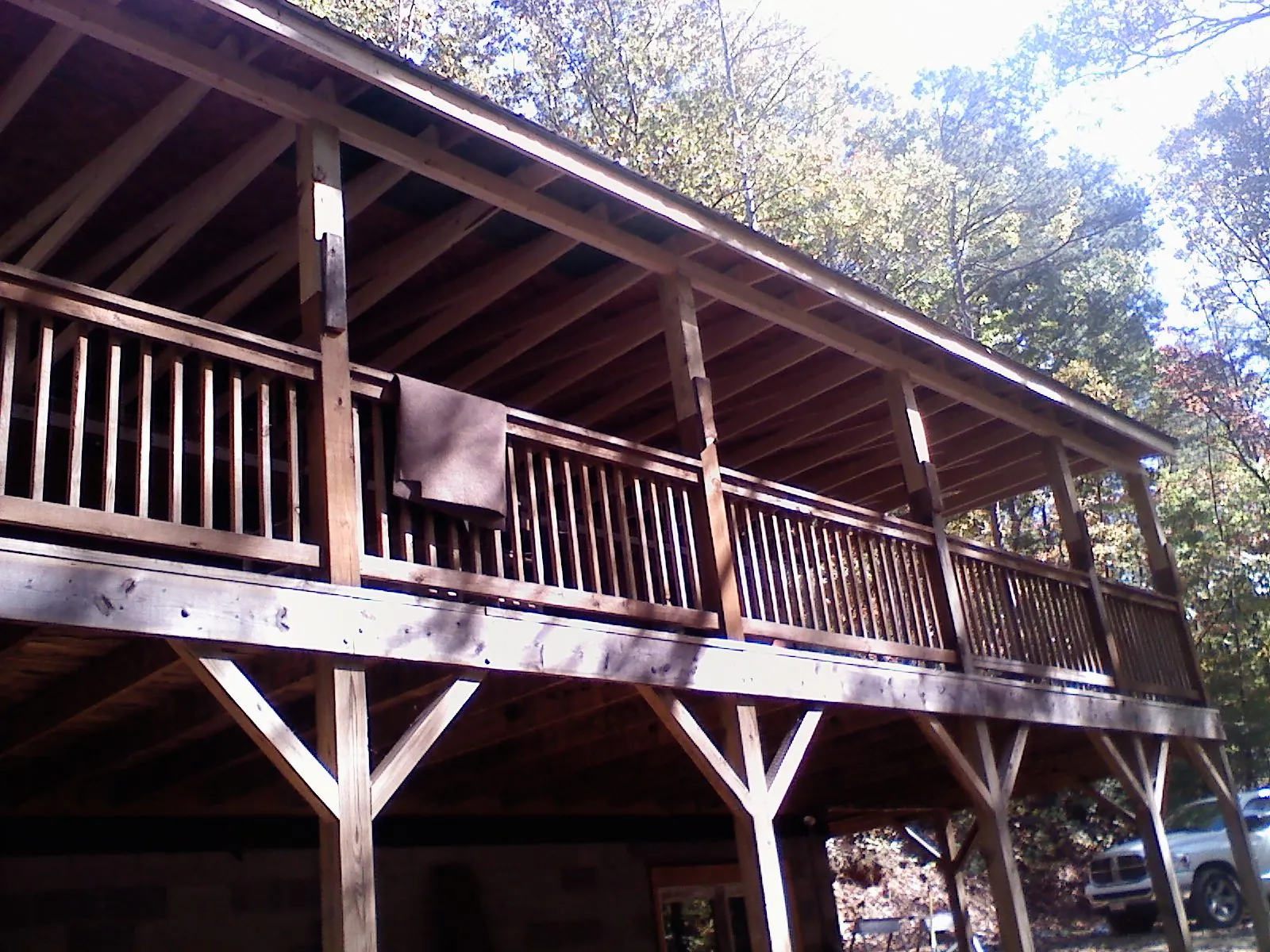 Timber framing under a new elevated porch and deck — Roof Leak Repair in Lake George by Roofing Brothers